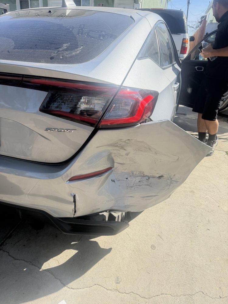 Honda rear bumper with collision damage before repair