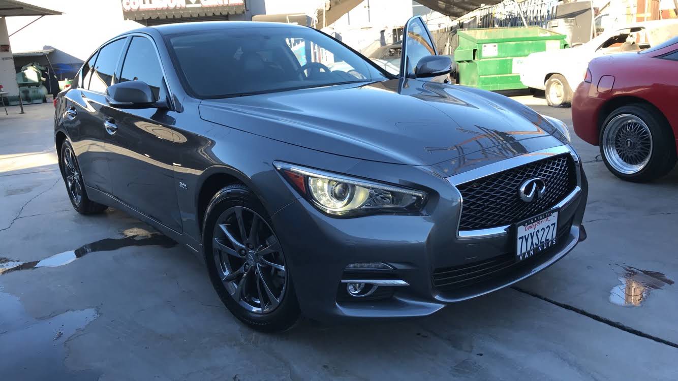 Gray Infiniti front end after collision repair and refinishing